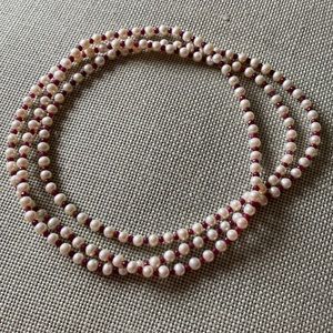 Fresh water pearls with red stones
